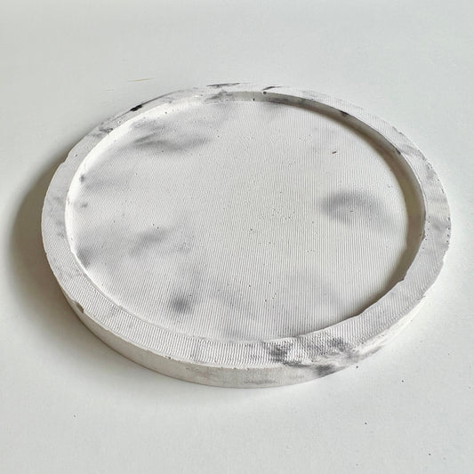 Vassoio tondo in cemento marmorizzato nero