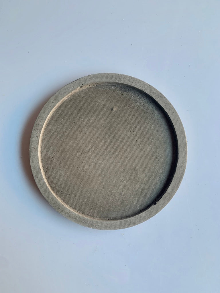 Vassoio tondo in cemento grigio scuro