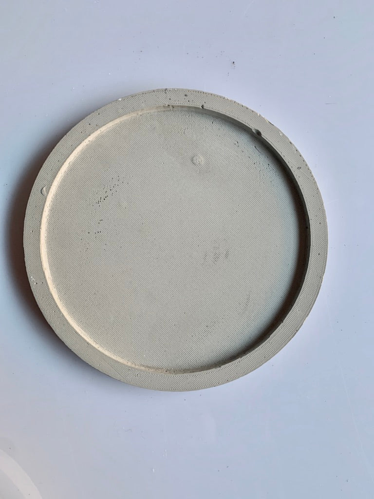 Vassoio tondo in cemento grigio