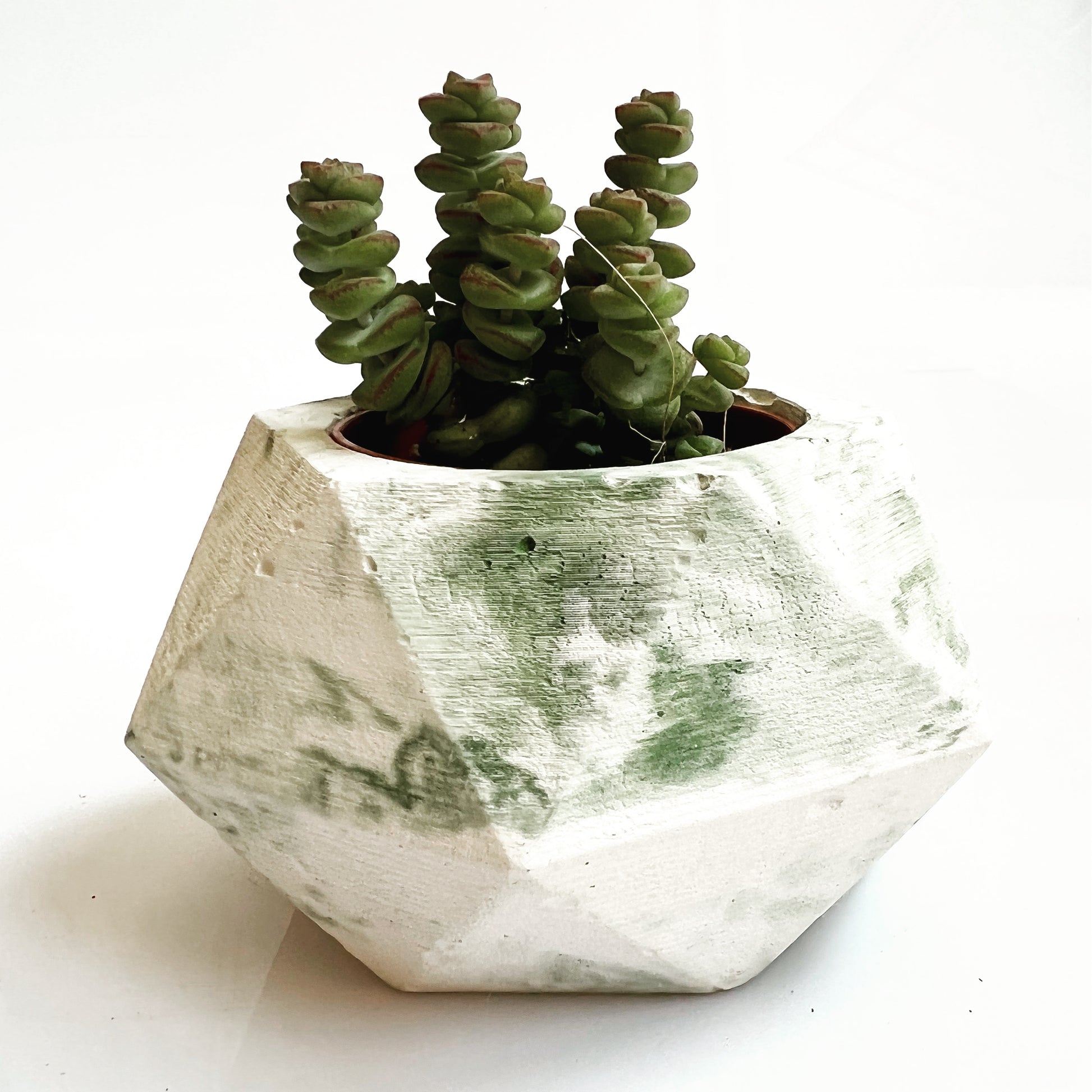 Vaso in cemento serie Isotta marmorizzato verde
